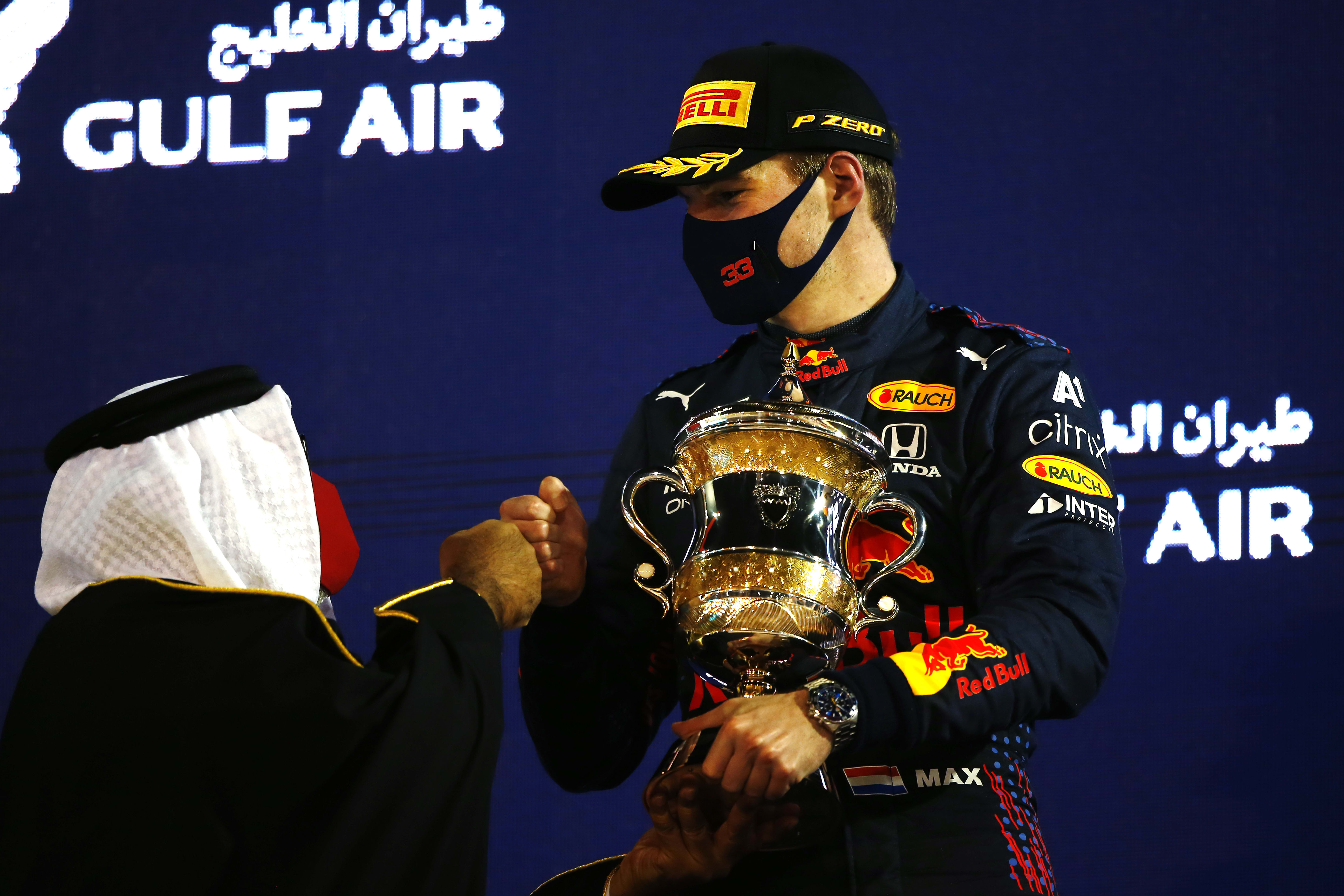 Max Verstappen holding his Bahrain Grand Prix second place trophy