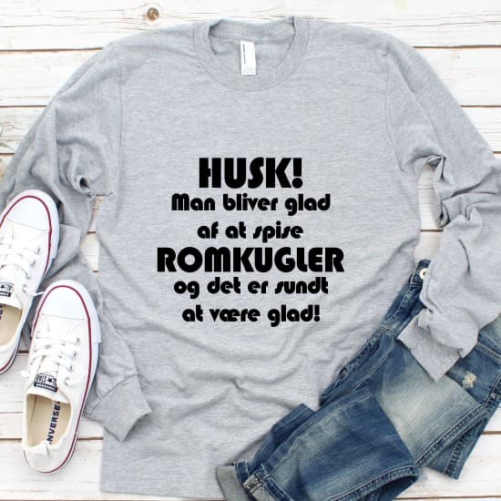 Man bliver glad af at spise romkugler - strygemærke Man bliver glad af at spise romkugler - strygemærke