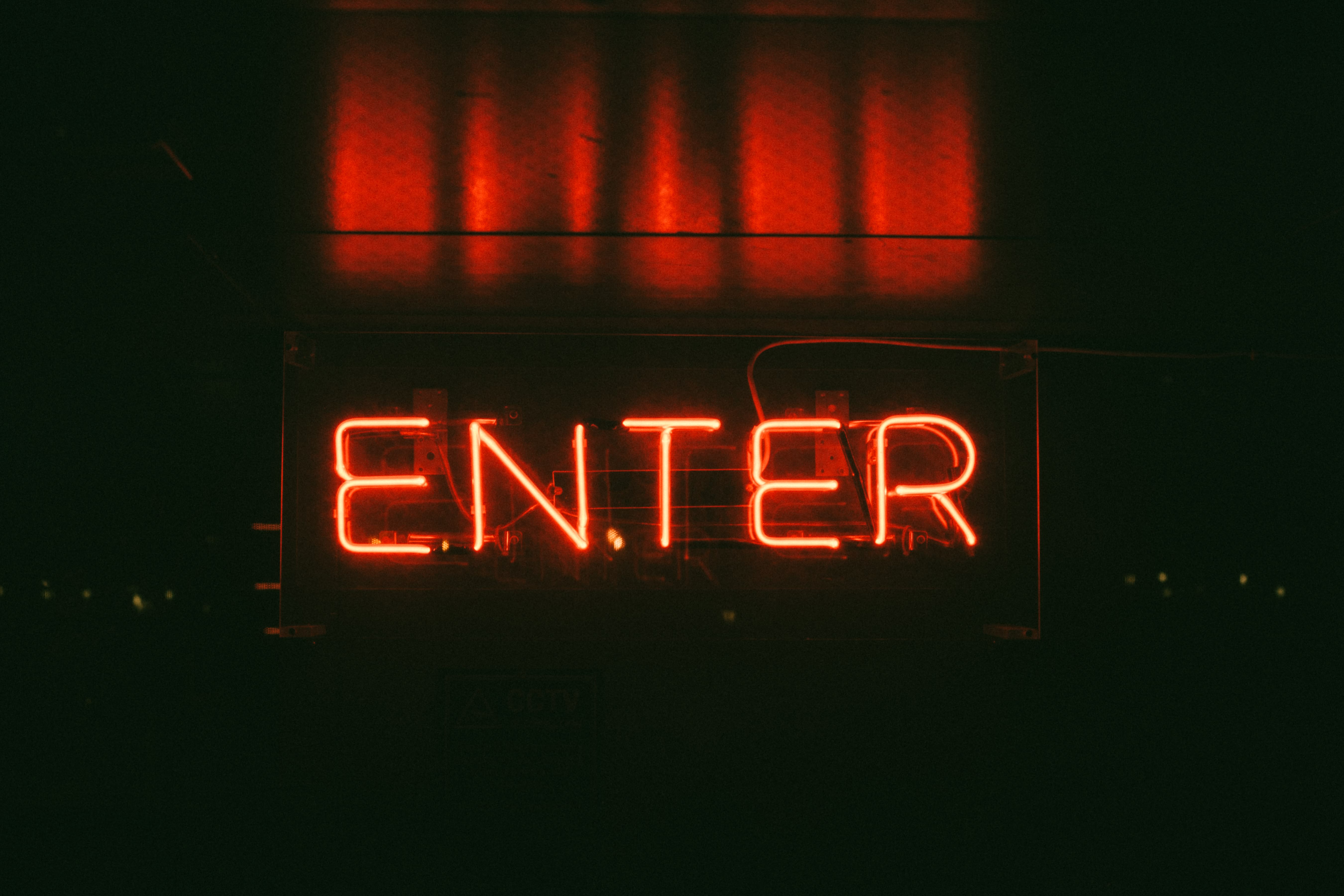 Red neon 'Enter' sign