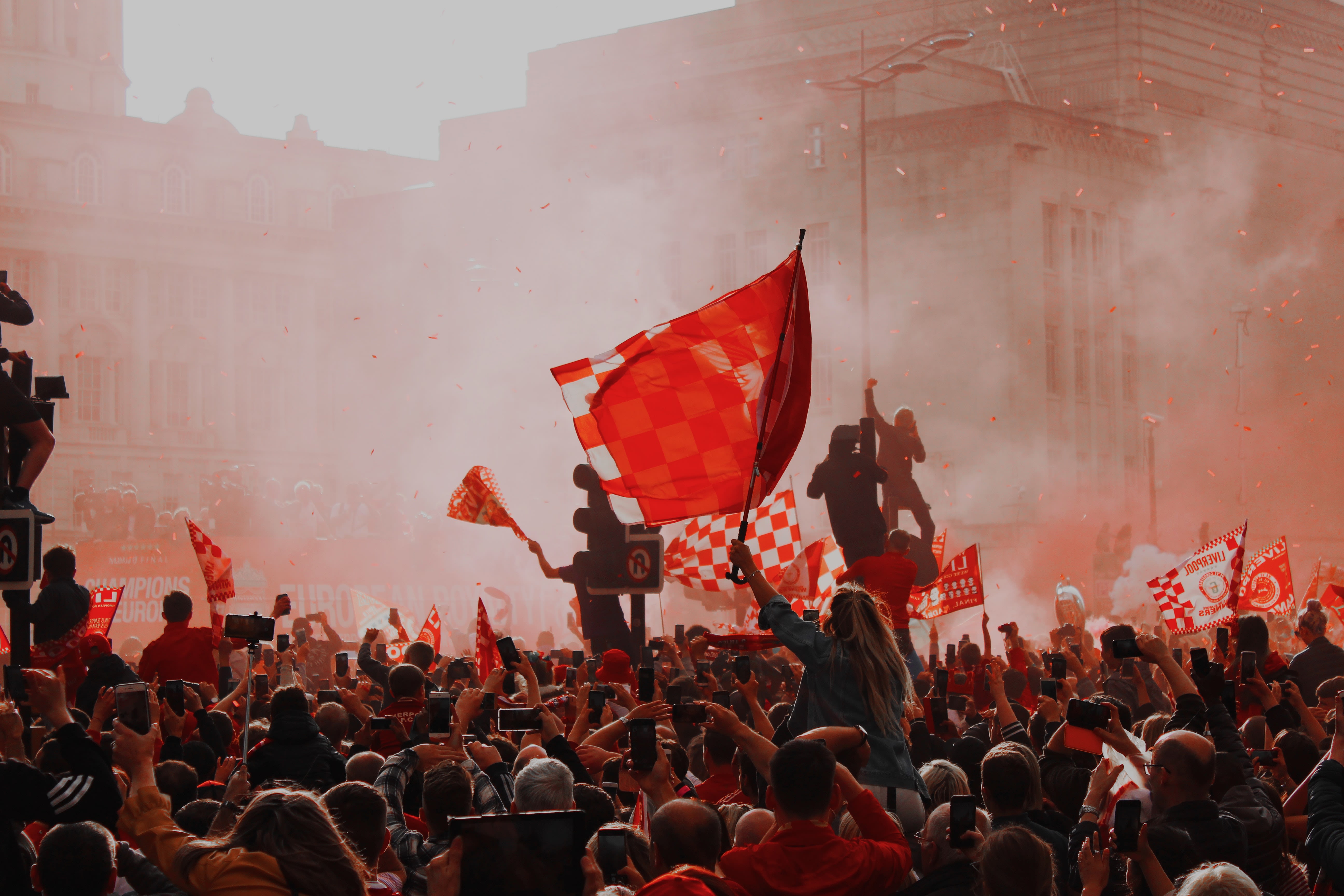 Fans celebrating Liverpool FC in the Victory Parade