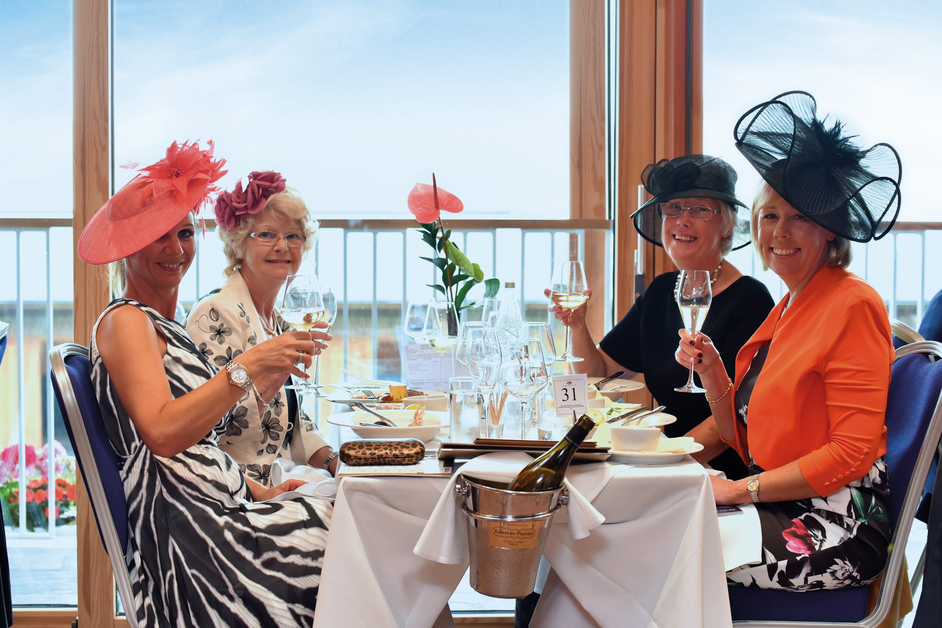 Ladies enjoy catering and refreshments with Parade Ring Restaurant hospitality 