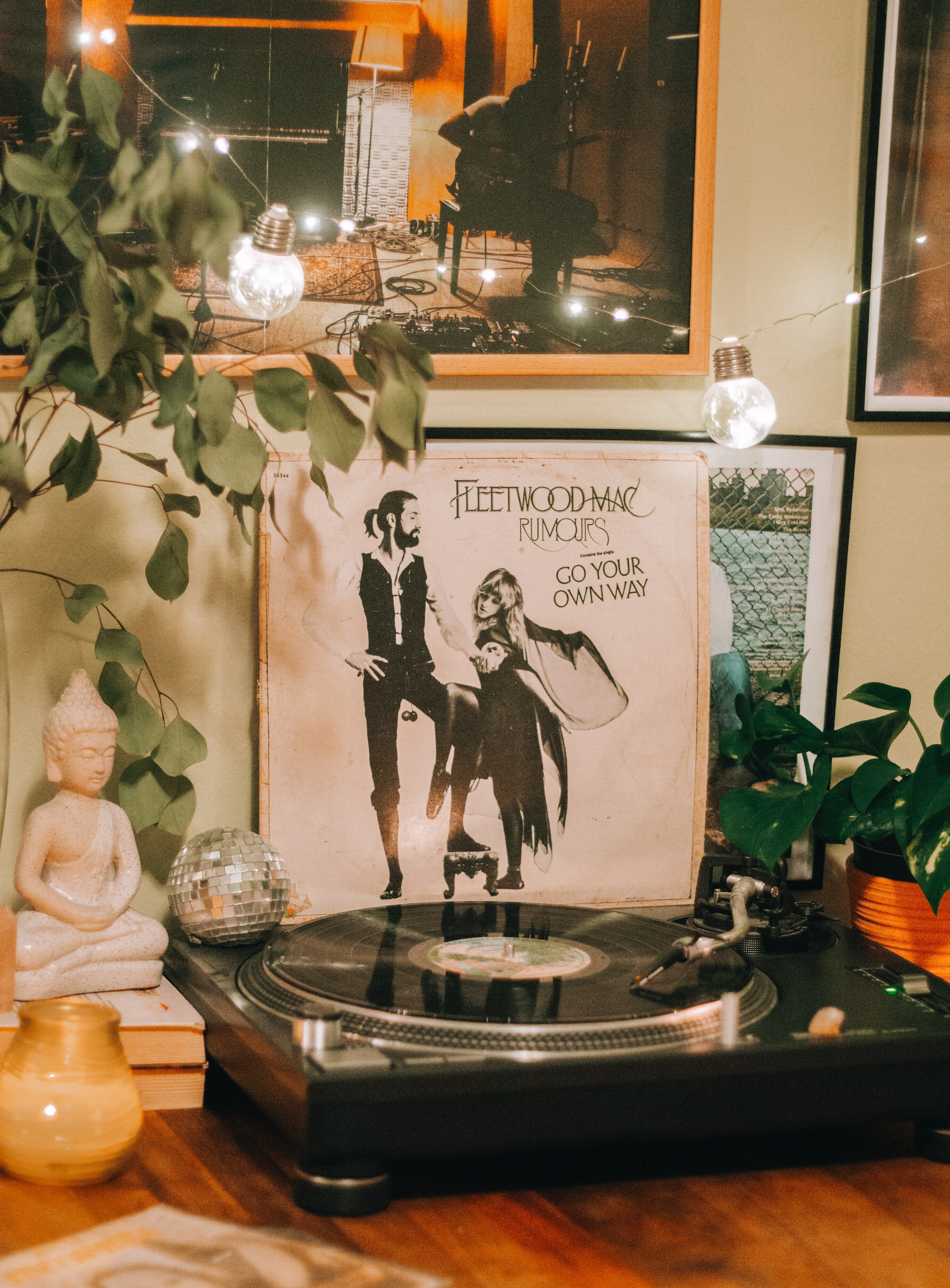 Fleetwood Mac's 'Rumours' album on vinyl sits behind a record player