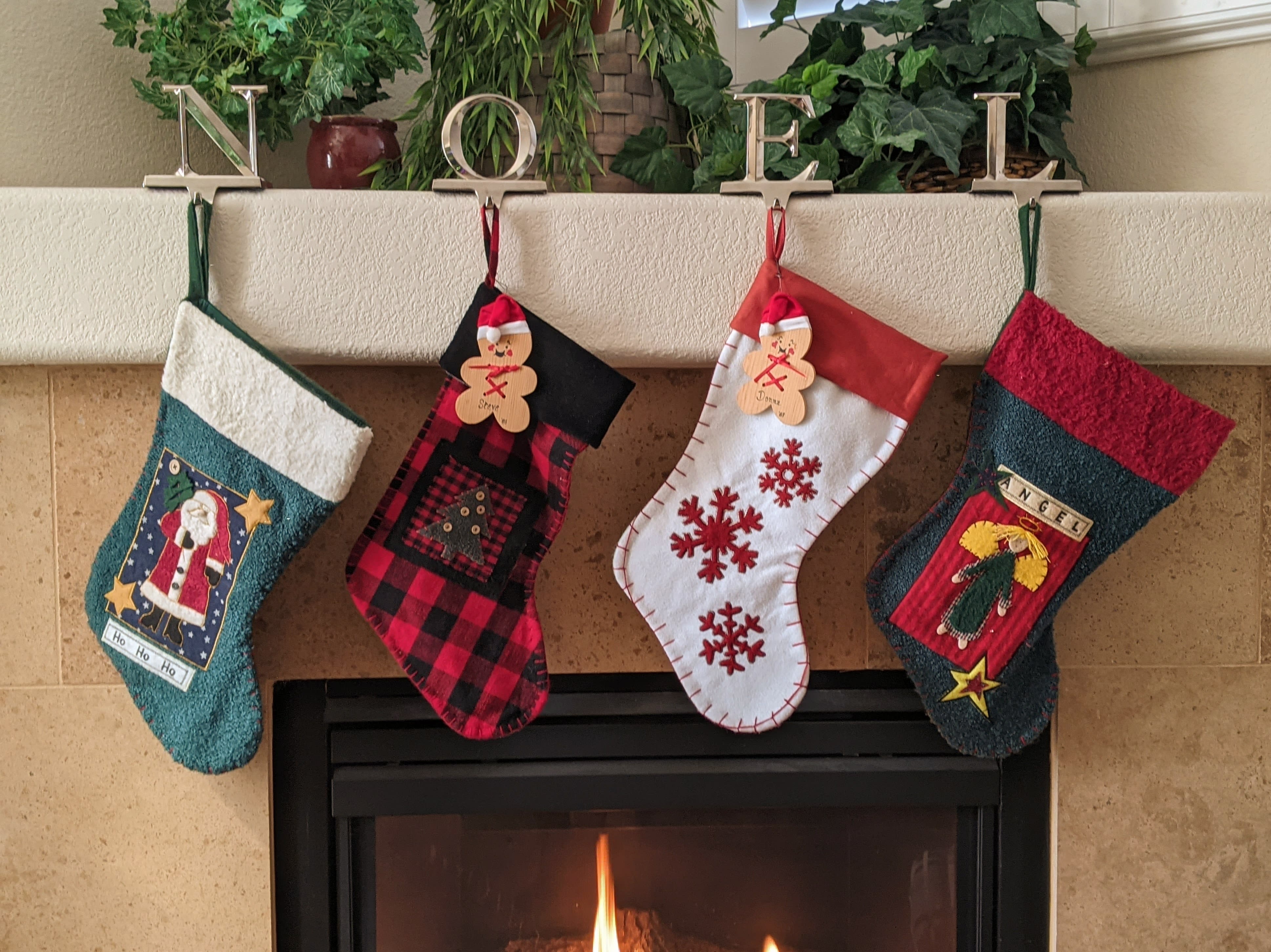 Christmas Stockings hanging on a fireplace