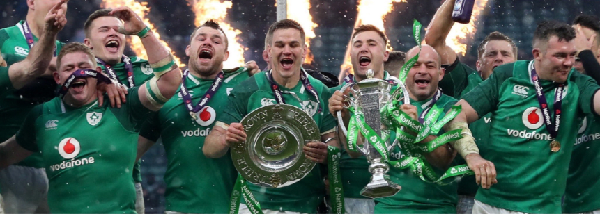 Ireland celebrating with the Six Nations trophy and Triple Crown trophy