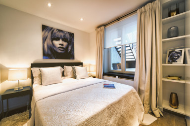 Bedroom with Queen Sized Bed / Smart TV
