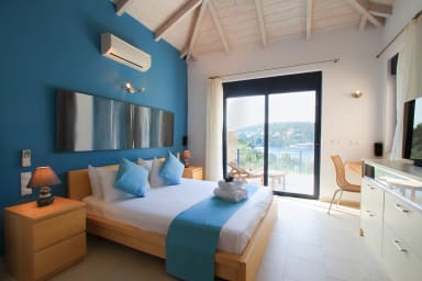 Blue bedroom with view on Sivota's bay
