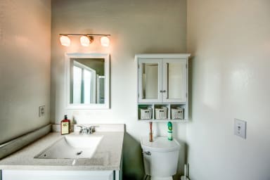 Toilette, drawers, sink, hand soap