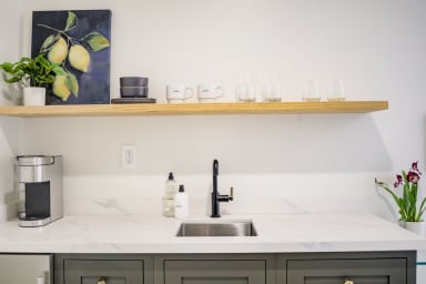 Kitchenette with Nespresso coffee machine, microwave & mini fridge