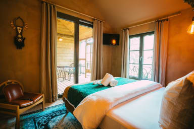 Chambre avec accès sur la terrasse