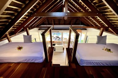 Twin beds in the mezzanine that can be pulled together to create a bigger bed...