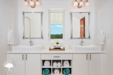 Two equal master suites with identical en-suite bathrooms.