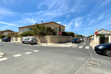 Maison qui fait l'angle