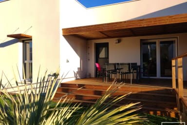 Front of the house with covered terrace under a pergola