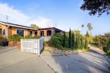 View from front driveway of the front of the home.