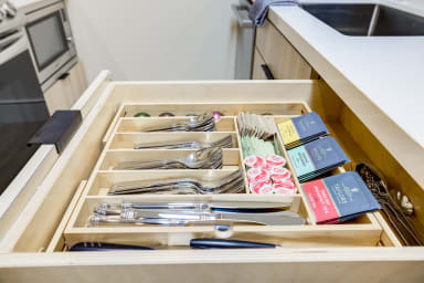 Essentials provided: silverware, coffee pods, Tea, and bottle opener.