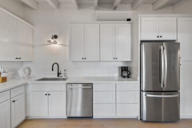 Full kitchen: Keurig, fridge, stove/oven, plates and utensils ,dishwasher