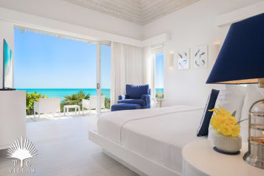 Master suite #1 with beach views and pool access.