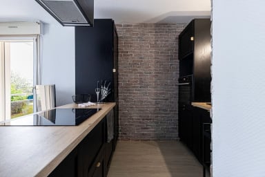 Cuisine entièrement équipée : La cuisine de l'appartement est équipée d'une...