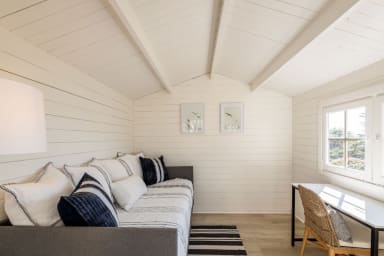 Cozy sofa inside the tool house