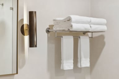 En-suite bathroom with rain shower and high-end toiletries