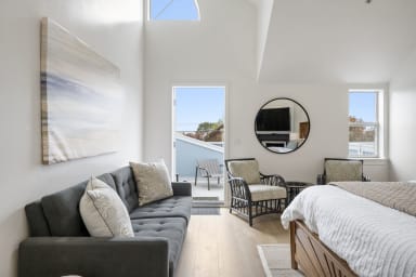 Cozy balcony with king bedroom and sofa bed