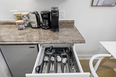 Well-equipped kitchen featuring all necessary tools for your meals
