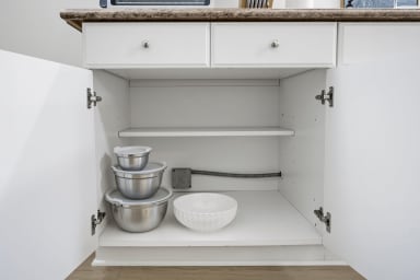Well-equipped kitchen featuring all necessary tools for your meals