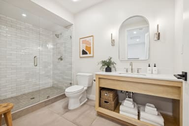 En-suite bathroom with shower and high-end toiletries