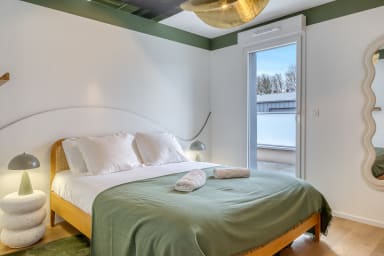 Lit double avec accès à la terrasse