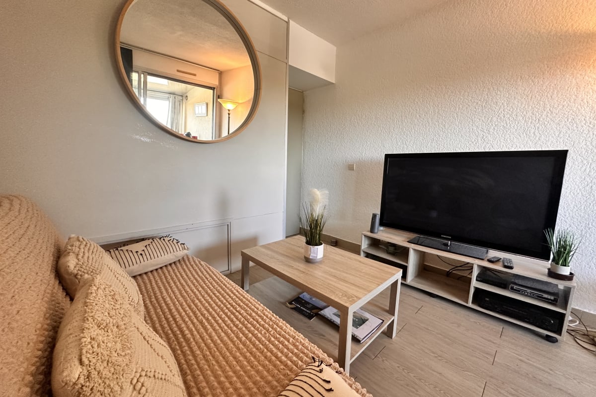  Appartement Le Quai aux Fleurs : séjour mer avec piscine