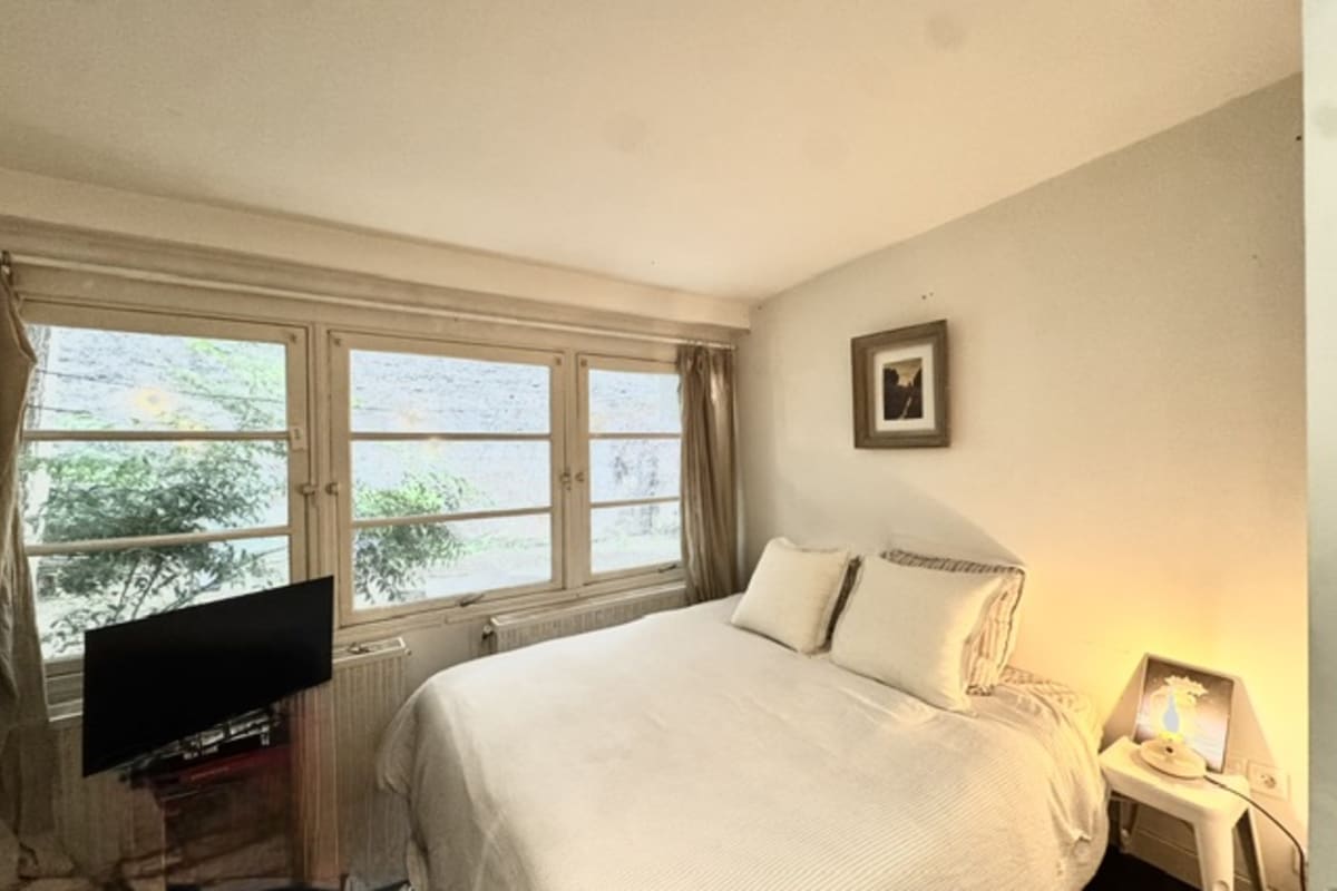 Maison   Maison loft 100m² avec jardin à Paris