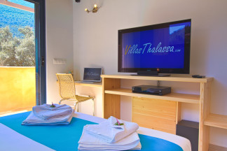 Bedroom 1 with TV and small office