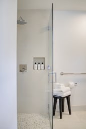 A private bath with a rain shower