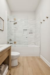 En-suite bathroom with rain shower and high-end toiletries