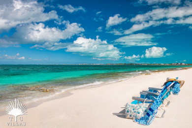 Grace Bay Beach; within steps of Nutmeg Cottage.