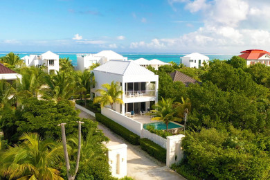 Little Plum in the Coconut Road Community within steps of Grace Bay Beach.