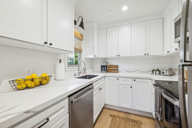 Full kitchen: Coffee drip, fridge, stove/oven, plates and utensils, dishwasher