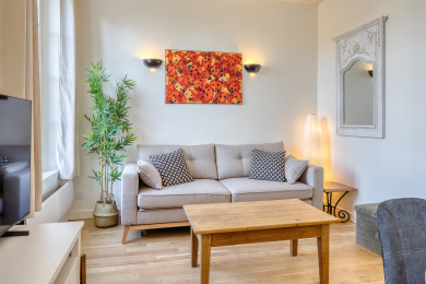 Salon cosy avec canapé-lit 