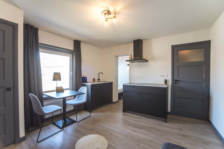 Private living room with fully equipped kitchen