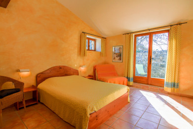 la chambre parentale avec une terrasse solarium privée