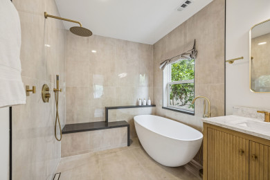 Fully renovated master bathroom with open shower and soaker tub!