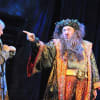 Tommy Steele as Ebenezer Scrooge and James Head as the Ghost of Christmas Present