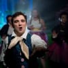 Matthew Kellett (foreground) as Buttons, Rosie Strobel as Prince Charming, Joanna Maria Skillett as Cinderella and Nichola Jolley as Dandini
