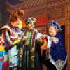 Matthew Kelly as Widow Twankey, David Badella as Abanazar and Jo Brand as the Genie of the Ring