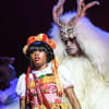 Helen Aluko as Belle and Vlach Ashton as Beast
