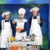 John Afzal (centre) as The Cook with Suneeta Maruthiyil and Griff Fender assisting