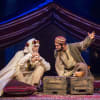 Joseph Fiennes as Lawrence and Eben Figueiredo as Rashid