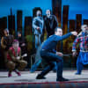 Ben Turner (centre) as Amir in The Kite Runner
