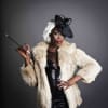 Gloria Onitiri as Cruella de Vil in The Hundred and One Dalmatians
