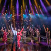 George Ionnades as Emilio Estefan, Christie Prades as Gloria Estefan and the company of On Your Feet! at Birmingham Hippodrome